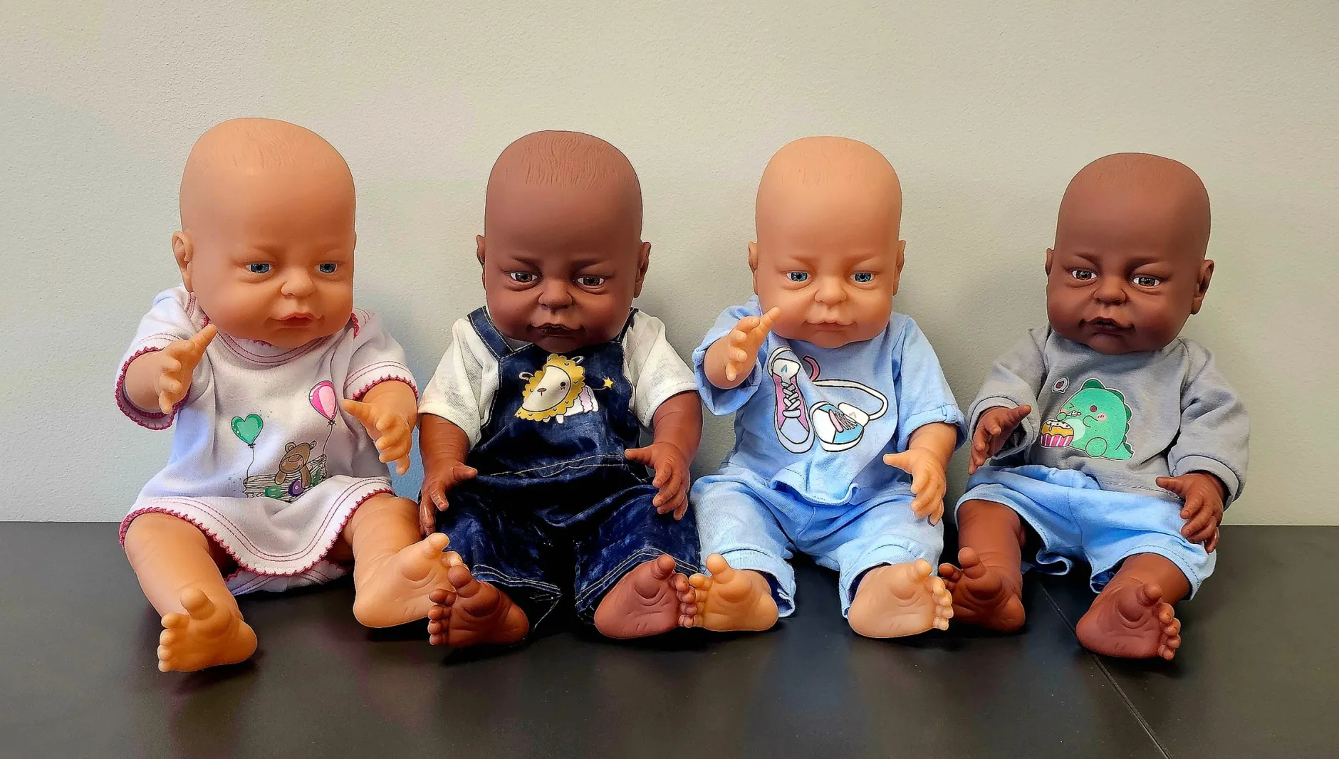 set_of__dolls_with_sleeps_0.webp LAP Set of 4 Dolls with Sleep-suits